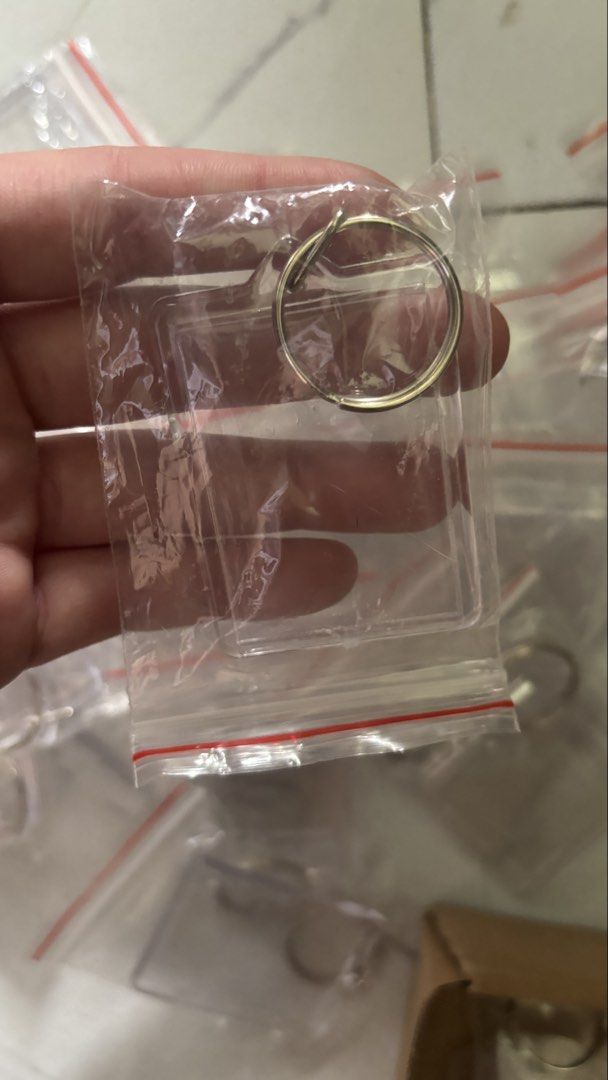 Clear Acrylic Keychain Blanks with Keyrings (Category: Craft Supplies & Tools) located in Cainta. Submitted by kd0529 (Listing ID 1437211848, Image 2). Description: - Clear acrylic keychain blanks - Includes keyring - Individually packaged - Perfect for DIY projects - Customize with your designs or logos.