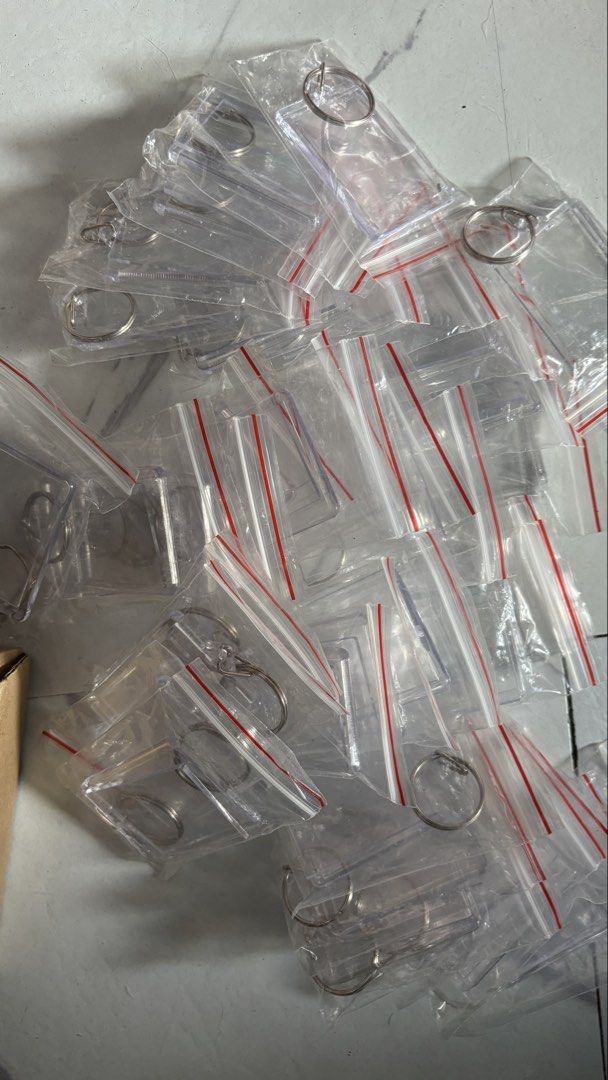 Clear Acrylic Keychain Blanks with Keyrings (Category: Craft Supplies & Tools) located in Cainta. Submitted by kd0529 (Listing ID 1437211848, Image 3). Description: - Clear acrylic keychain blanks - Includes keyring - Individually packaged - Perfect for DIY projects - Customize with your designs or logos.