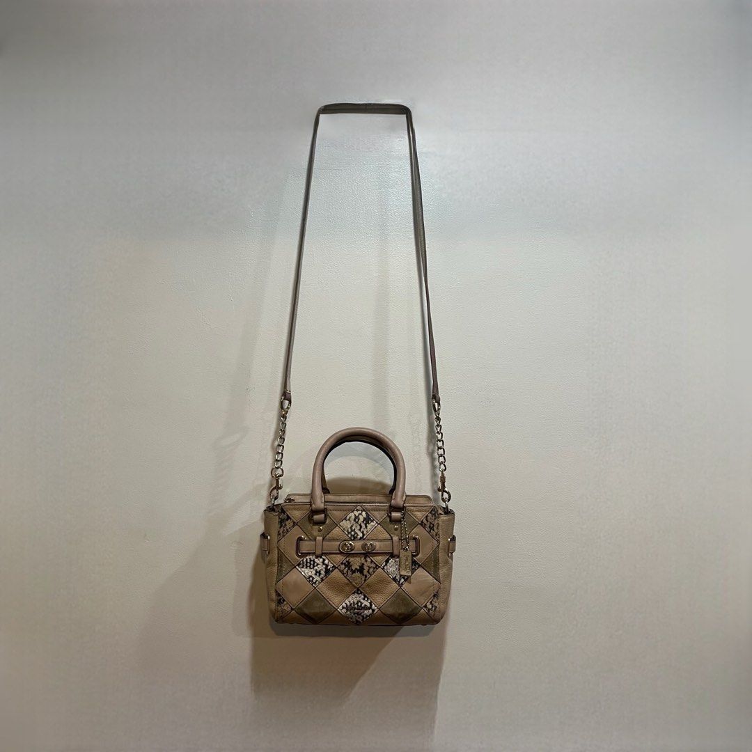 Coach Mini Blake Carryall in Snake Embrossed Patchwork Leather (Category: Luxury Bags & Wallets) located in Manila. Submitted by couture_cache (Listing ID 1437291226, Image 2). Description: Needed to spa! Yung sling replaced and repainted pero still from coach brand expect the hardware within below of the sling strap. Yung creed washed-off so I cannot read the model number anymore! YKK zippers! Selling for reasonable price so manage your expectat