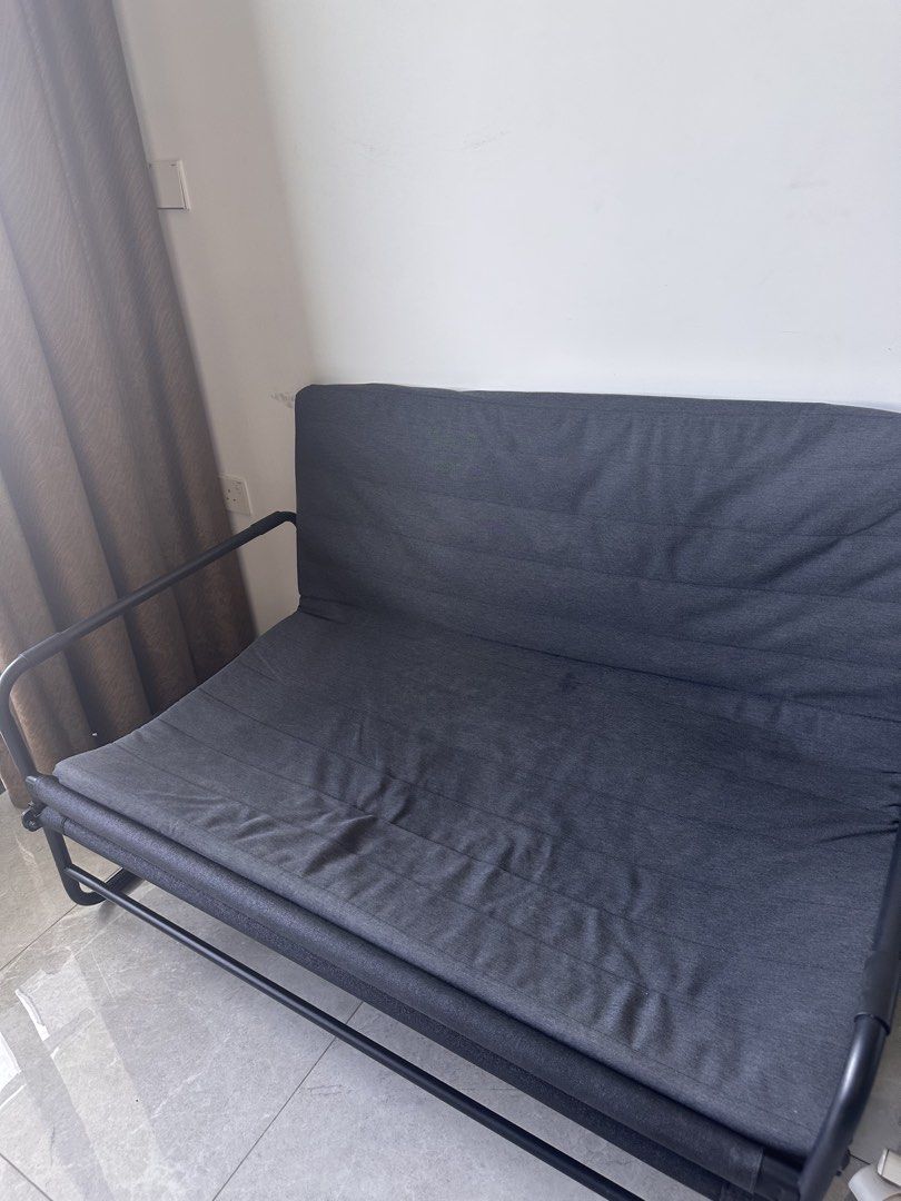 Dark Grey Sofa Bed (Category: Sofas) located in Singapore. Submitted by abcdsusie (Listing ID 1437378375, Image 1). Description: - Dark grey sofa bed - Perfect for small spaces and guest rooms - Sturdy metal frame - Simple, modern design - Easy sofa-to-bed conversion.