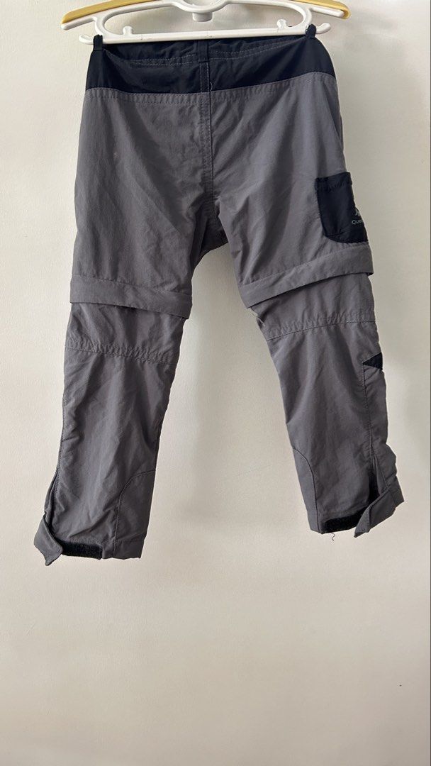 Decathlon Quechua convertible hiking pants (Category: Babies & Kids Fashion) located in Carmona. Submitted by jjzamoraa (Listing ID 1437216560, Image 2). Description: - Gray convertible pants (shorts option) - Black accents on knees and waist - Features pockets - Button and zipper closure - Garter adjustment on the waist - Barely noticeable (washable) minor stain on the back, left side. .