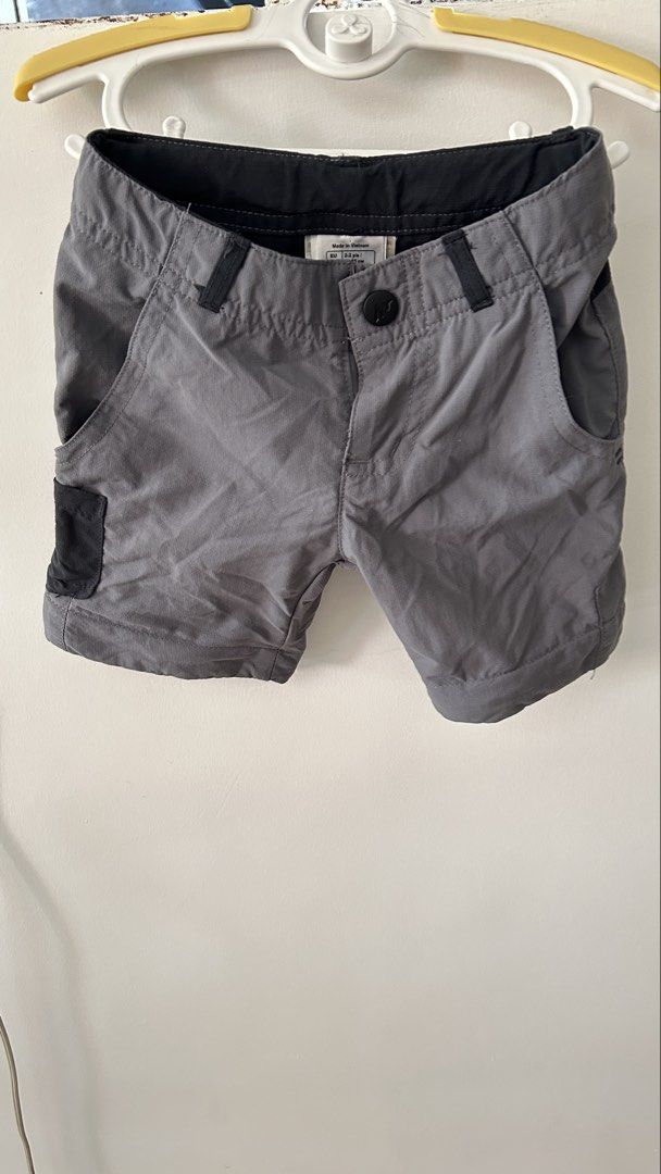 Decathlon Quechua convertible hiking pants (Category: Babies & Kids Fashion) located in Carmona. Submitted by jjzamoraa (Listing ID 1437216560, Image 3). Description: - Gray convertible pants (shorts option) - Black accents on knees and waist - Features pockets - Button and zipper closure - Garter adjustment on the waist - Barely noticeable (washable) minor stain on the back, left side. .