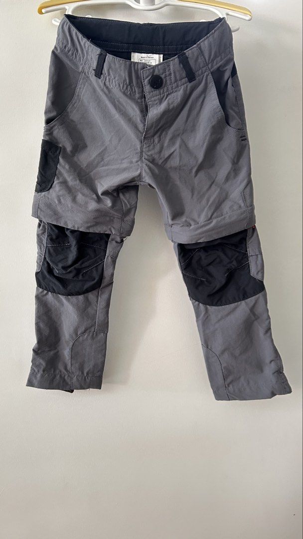 Decathlon Quechua convertible hiking pants (Category: Babies & Kids Fashion) located in Carmona. Submitted by jjzamoraa (Listing ID 1437216560, Image 1). Description: - Gray convertible pants (shorts option) - Black accents on knees and waist - Features pockets - Button and zipper closure - Garter adjustment on the waist - Barely noticeable (washable) minor stain on the back, left side. .