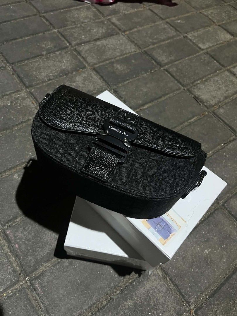 Dior Saddle Bag (Category: Luxury Bags & Wallets) located in Las Pinas. Submitted by yoahanne (Listing ID 1437213349, Image 2). Description: DIOR SLING BAG FOR SALE ONLY UA FOR ONLY ₱1,199 BRANDNEW NOT USED DM FOR DETAILS LAS PIÑAS LOC📍 DM IF INTERESTED..
