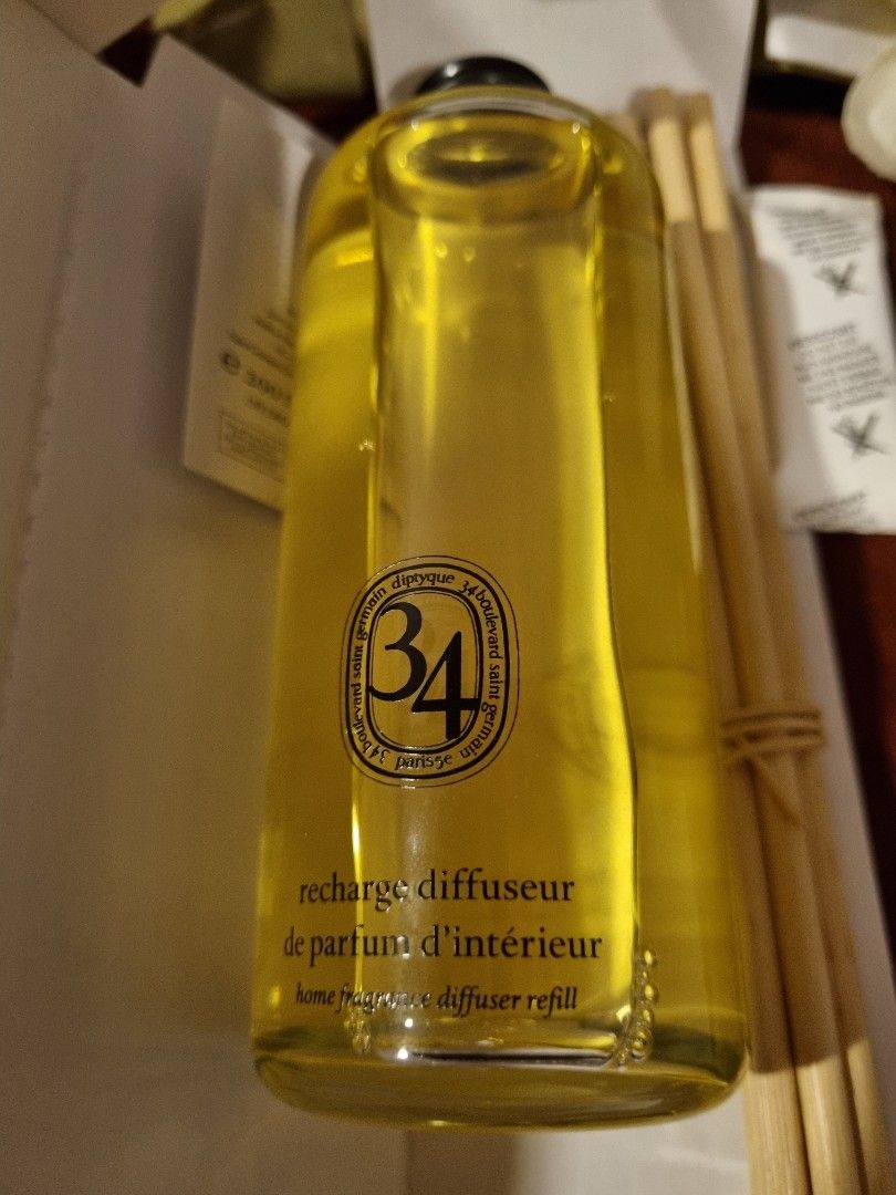 Diptyque diffuser (Category: Home Fragrance) located in Singapore. Submitted by bags2015 (Listing ID 1437343171, Image 3). Description: 1)Diptyque Diffuser in glass vessel. 2) 200ml signature scent, 34 3) With diffuser stopper 4) Packaging in paper carrier 5) Retail price $318 .
