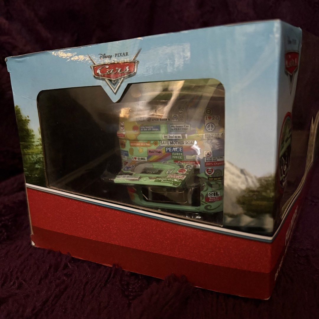 Disney Pixar Cars Fillmore Diecast (Category: Toys & Games) located in Pasig City. Submitted by sinta_studio (Listing ID 1437310687, Image 3). Description: Never used or played, just opened the box to check - 7” in length - Fillmore diecast car from the Disney Pixar Cars movie. - Features a detailed design. - Iconic peace and flower graphics. - Made of metal. - Comes in its original packaging. - Perfect for Cars collectors..