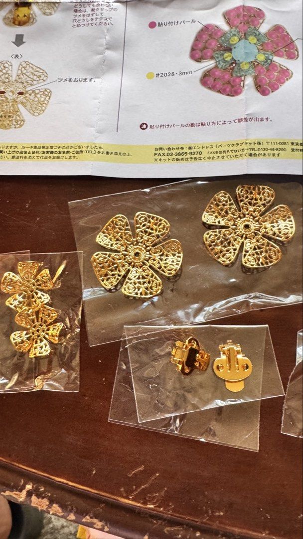 DIY Flower Earrings Kit or shoe clip (Category: Earrings) located in Santa Cruz. Submitted by maqui15 (Listing ID 1437396842, Image 2). Description: - DIY Earring/shoe clip Making Kit - Includes: - Gold flower-shaped metal pieces - Various sizes of pearl beads - clips - Clear string - Instructions - Create unique, handmade shoe clip or earrings!.