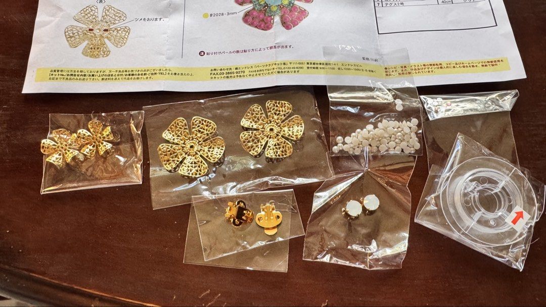 DIY Flower Earrings Kit or shoe clip (Category: Earrings) located in Santa Cruz. Submitted by maqui15 (Listing ID 1437396842, Image 1). Description: - DIY Earring/shoe clip Making Kit - Includes: - Gold flower-shaped metal pieces - Various sizes of pearl beads - clips - Clear string - Instructions - Create unique, handmade shoe clip or earrings!.