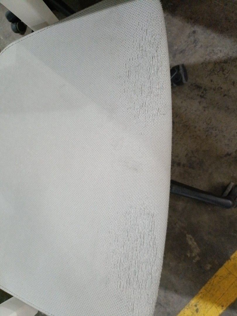 Ergonomic Office Chair with White Mesh Back (Category: Office Furniture & Fixtures) located in Paranaque City. Submitted by materesadimasaca (Listing ID 1437261975, Image 2). Description: - Ergonomic office chair - White mesh back - Light grey seat - Features armrests - Black base with wheels - Designed for comfort and support - Suitable for long work hours - Ideal for home and office use.