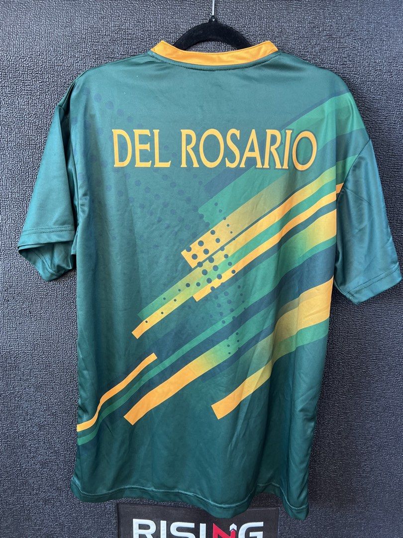 FEU UAAP Jersey (Category: Tshirts & Polo Shirts ) located in Taytay. Submitted by cside1900 (Listing ID 1437377173, Image 2). Description: - FEU Del Rosario jersey - Green and yellow color scheme - V-neck design - Short sleeves - Hawk brand - Made of lightweight, athletic material.