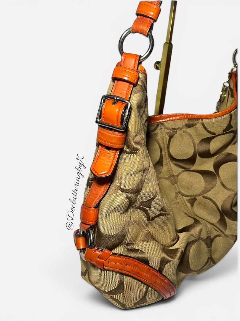 Auth vintage Coach Hobo Handbag (Category: Luxury Bags & Wallets) located in Imus. Submitted by declutteringbyk (Listing ID 1437234840, Image 1). Description: -Auth Coach signature hobo handbag - Orange leather trim and straps -charm not included -Bought in Japan -no issue. Like new.