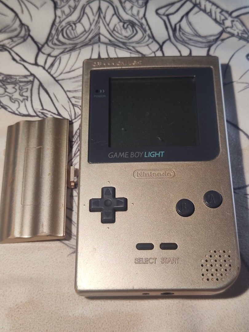Game boy light gold (working) CLEAR SCREEN **exclusive Japan release** (Category: Nintendo) located in Manila. Submitted by olx156 (Listing ID 1437344550, Image 1). Description: Exclusive Japan release CLEAR SCREEN with backlight 100% working all buttons with loud sound vintage console has minimal scratches. please see actual pics. (Collectors Item) Mode of payment GCASH Courier Lalamove within Metro Manila Outside Jnt or LBC (flash express) not 