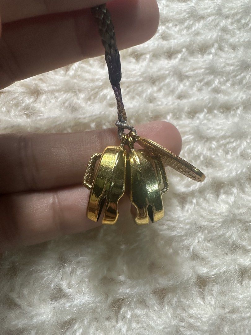 Gold tone sandal keychain with bell (Category: Everything Else Others) located in Davao. Submitted by favoritepreloved (Listing ID 1437246088, Image 3). Description: .