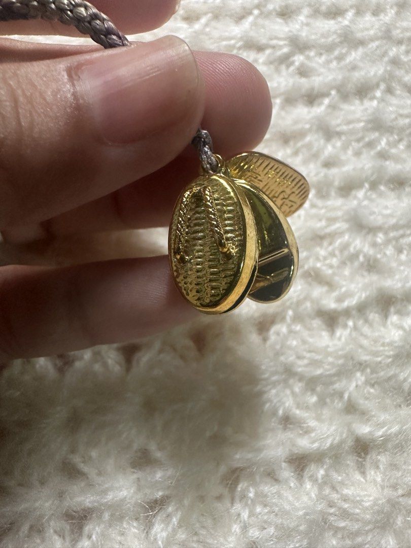 Gold tone sandal keychain with bell (Category: Everything Else Others) located in Davao. Submitted by favoritepreloved (Listing ID 1437246088, Image 2). Description: .