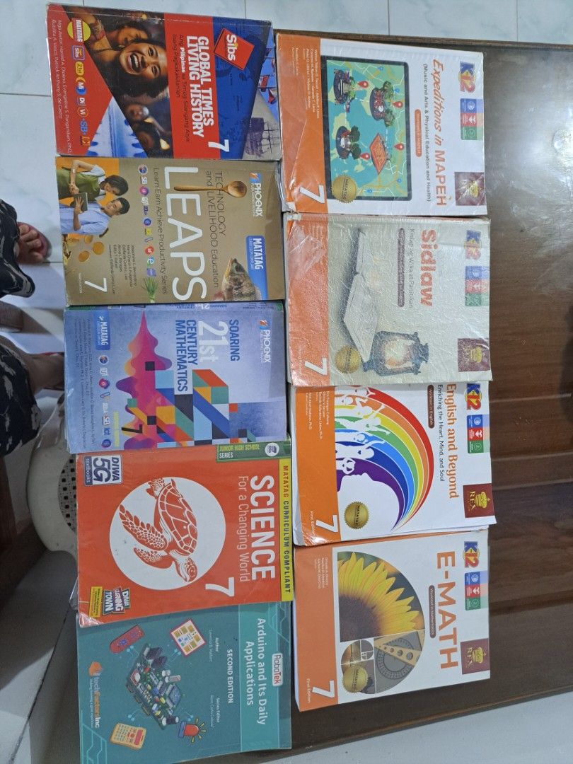 Grade 7 Textbooks (Category: Textbooks) located in Quezon City. Submitted by hersheejubilo (Listing ID 1437312341, Image 1). Description: - Complete set of Grade 7 textbooks. - Titles include: - Expeditions in MAPEH - Sidlaw - English and Beyond - E-Math - Global Times Living History - LEAPS - Soaring 21st Century Mathematics - Science for a Changing World - Arduino and Its Daily Applications - All books are for Grade 7 students. Suitable for stu
