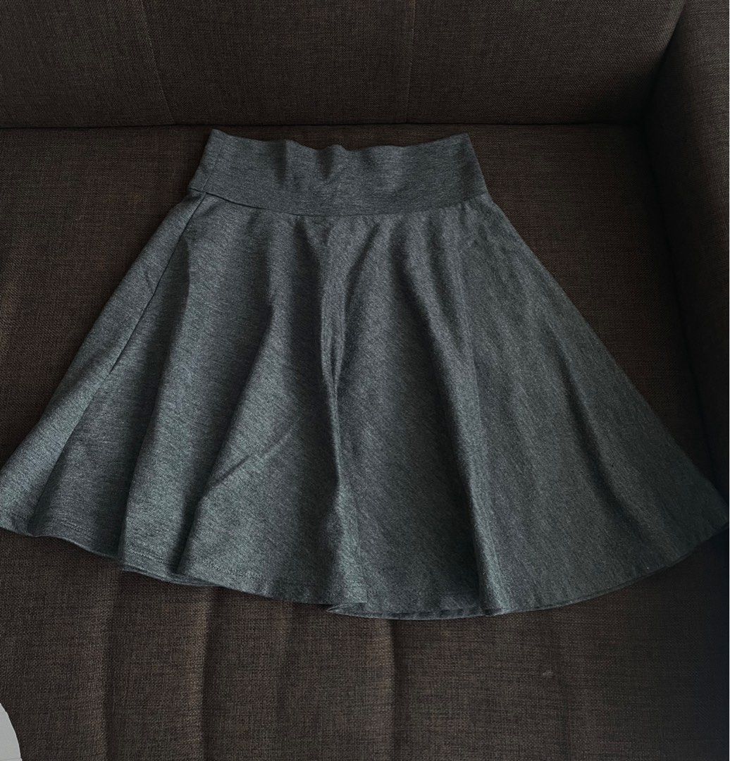 Gray Flare Skirt High-Waist Size S (Category: Skirts) located in Manila. Submitted by hellonuggy (Listing ID 1437334608, Image 1). Description: - Gray flare skirt - High-waist style - Size S - Soft fabric - Flared design - Versatile for any occasion.