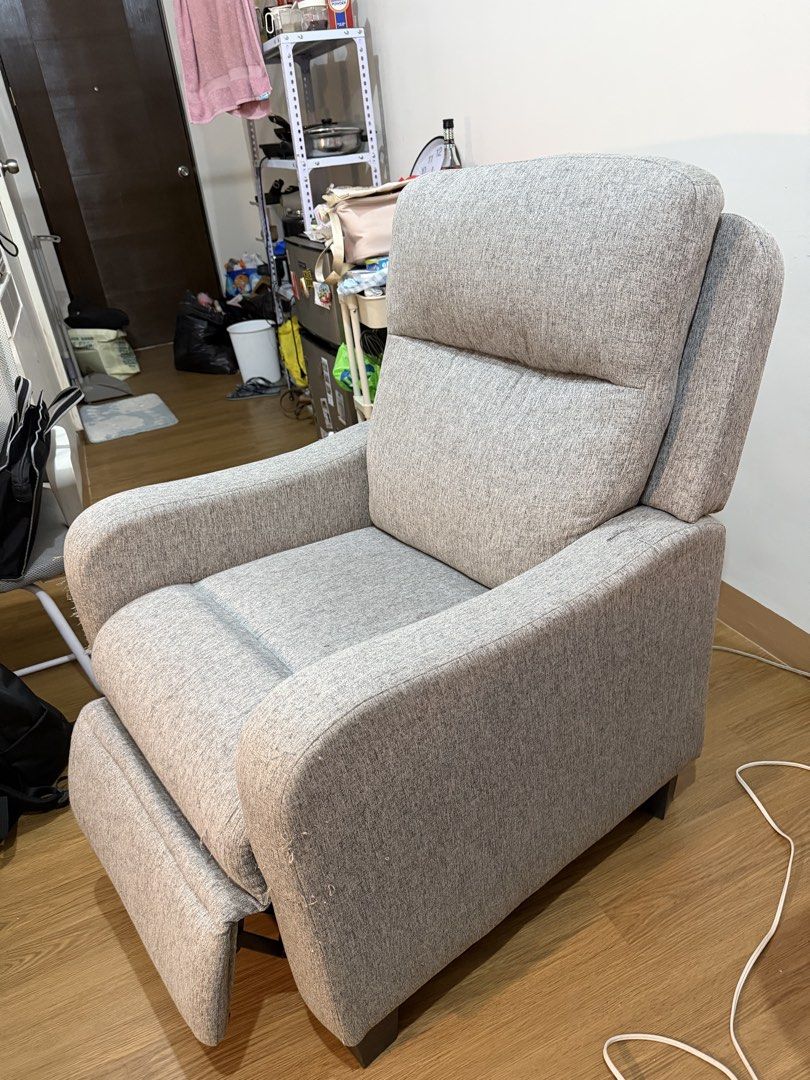 Grey Fabric Recliner Chair (Category: Chairs) located in Quezon City. Submitted by bernsbernsbern (Listing ID 1437216979, Image 3). Description: - in good condition EXCEPT of loose threads due to cat scratches - delivery fee c/o buyer -buyer must be within metro manila only - if pick up: available only on weekends Loc: Xavierville Loyola Heights QC .