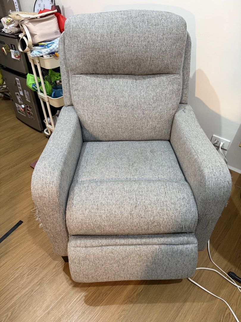 Grey Fabric Recliner Chair (Category: Chairs) located in Quezon City. Submitted by bernsbernsbern (Listing ID 1437216979, Image 1). Description: - in good condition EXCEPT of loose threads due to cat scratches - delivery fee c/o buyer -buyer must be within metro manila only - if pick up: available only on weekends Loc: Xavierville Loyola Heights QC .