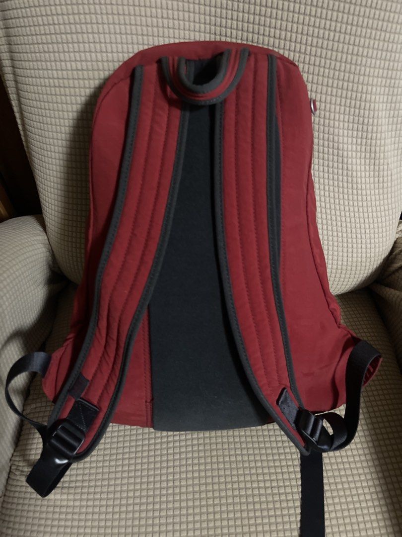 Hedgren Red Backpack (Category: Backpacks) located in Manila. Submitted by rlyt007 (Listing ID 1437316656, Image 2). Description: - Hedgren backpack in a striking red and gray color scheme. - Main compartment with zippered and internal pockets. - Comfortable padded back panel and shoulder straps. - Includes a top handle and adjustable shoulder straps. - Features the Hedgren logo..