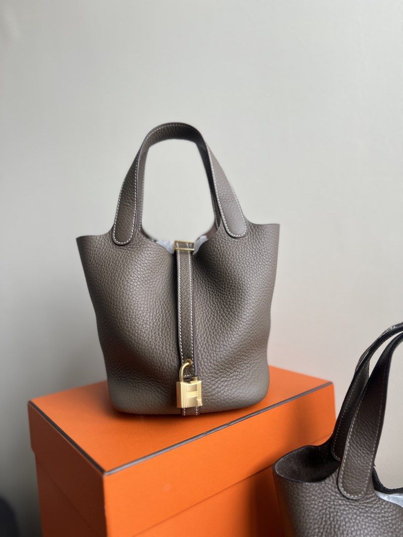 Hermes Picotin Lock Handbag (Category: Luxury Bags & Wallets) located in Quezon City. Submitted by _cherryontop_ (Listing ID 1437372949, Image 1). Description: Picotin Lock 18 in Etoupe GHW Stamp K good as new full set with copy of receipt.