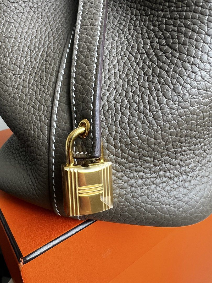 Hermes Picotin Lock Handbag (Category: Luxury Bags & Wallets) located in Quezon City. Submitted by _cherryontop_ (Listing ID 1437372949, Image 2). Description: Picotin Lock 18 in Etoupe GHW Stamp K good as new full set with copy of receipt.