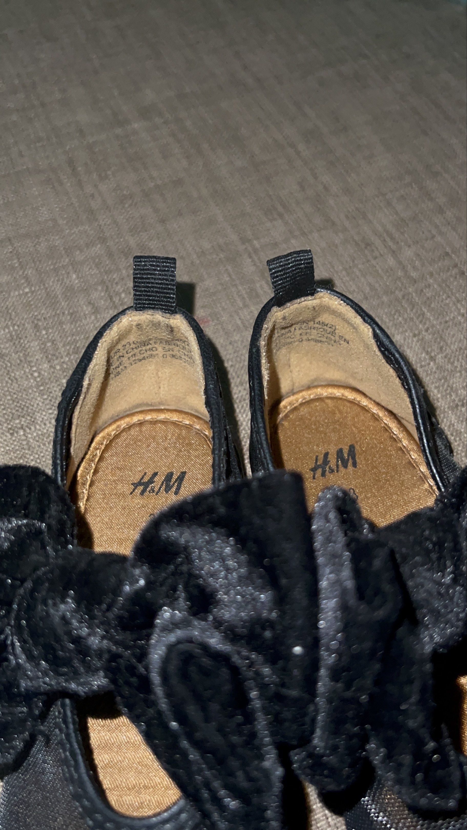 H&M Black Bow Shoes Size 23 (Category: Babies & Kids Fashion) located in Manila. Submitted by ccccccc08 (Listing ID 1437337408, Image 2). Description: - H&M black baby shoes - Size 23 - Features a cute bow - Some wear on soles - Perfect for special occasions or everyday wear - Comfortable and stylish.