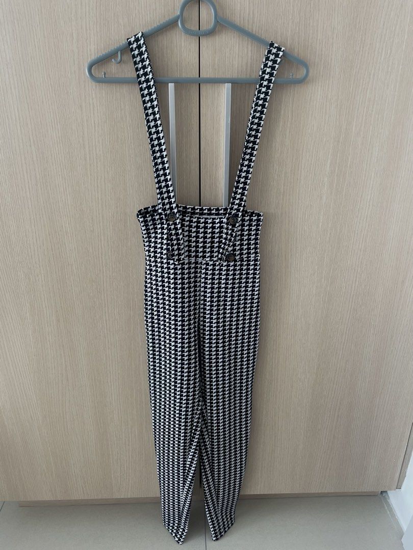 Houndstooth Jumpsuit XS-S (Category: Jumpsuits) located in Manila. Submitted by hellonuggy (Listing ID 1437334602, Image 1). Description: - Houndstooth jumpsuit - Size: XS-S - Features: High-waisted design, suspender straps, button details - Pattern: Black and white - Condition: Worn once - Stretch fabric.