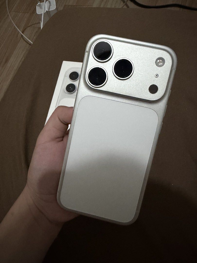 Iphone 17 Pro Silver (256 GB) (Category: iPhone 17 Series) located in Quezon City. Submitted by loveeedbyrl (Listing ID 1437226817, Image 2). Description: Iphone 17 pro SILVER (256 GB) Bought from power mac No dents & scratches (see pics) Warranty until 02/07/2027 Always used with case + screen protector February 2026 first use 100% battery health 130 cycle count Lady owned Complete inclusions: Box (same imei) Original cord No to lawballers pls! 