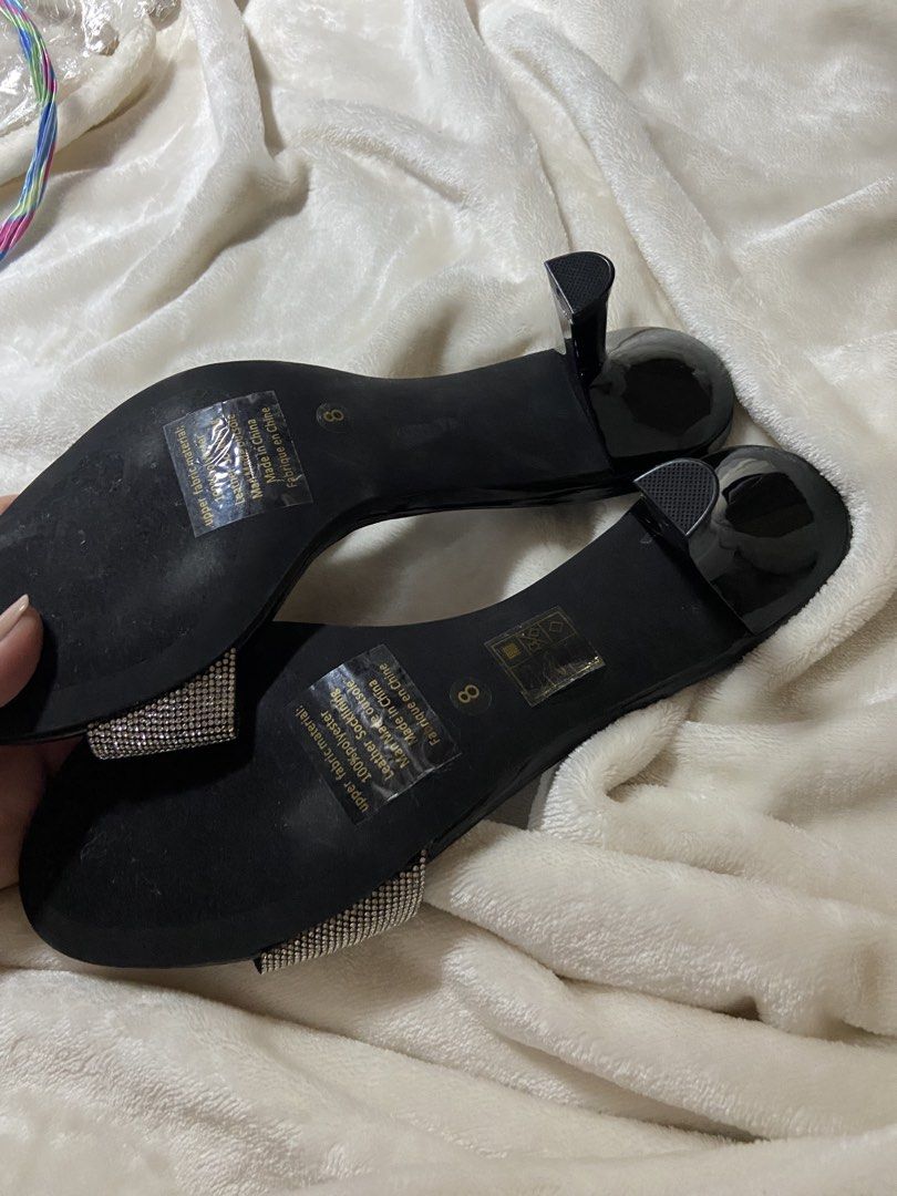 Jeffrey Campbell Heels (Category: Sneakers & Footwear) located in Badoc. Submitted by fourforfourtrift (Listing ID 1437314005, Image 2). Description: - Jeffrey Campbell Heels - Size 8 - Features a sparkling strap - Elegant black color - Perfect for adding a touch of glam.