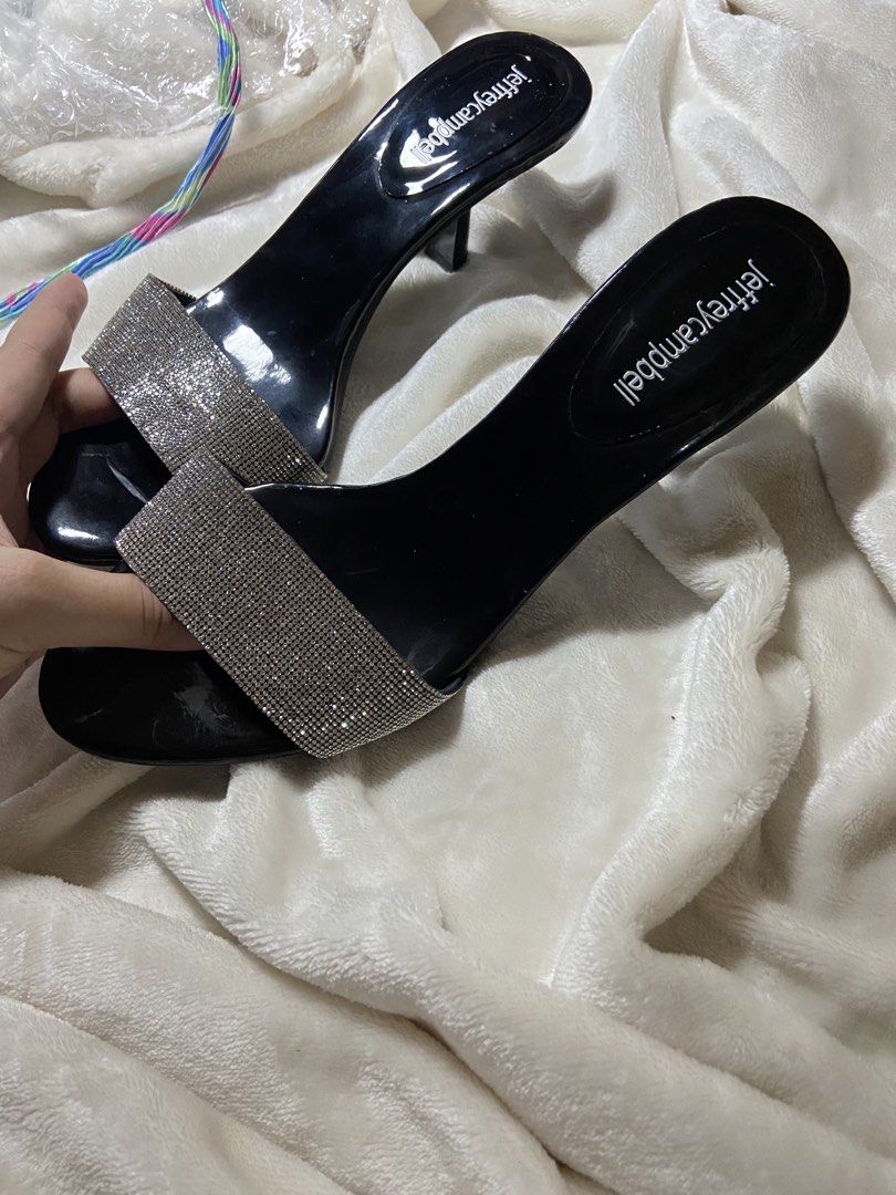 Jeffrey Campbell Heels (Category: Sneakers & Footwear) located in Badoc. Submitted by fourforfourtrift (Listing ID 1437314005, Image 1). Description: - Jeffrey Campbell Heels - Size 8 - Features a sparkling strap - Elegant black color - Perfect for adding a touch of glam.
