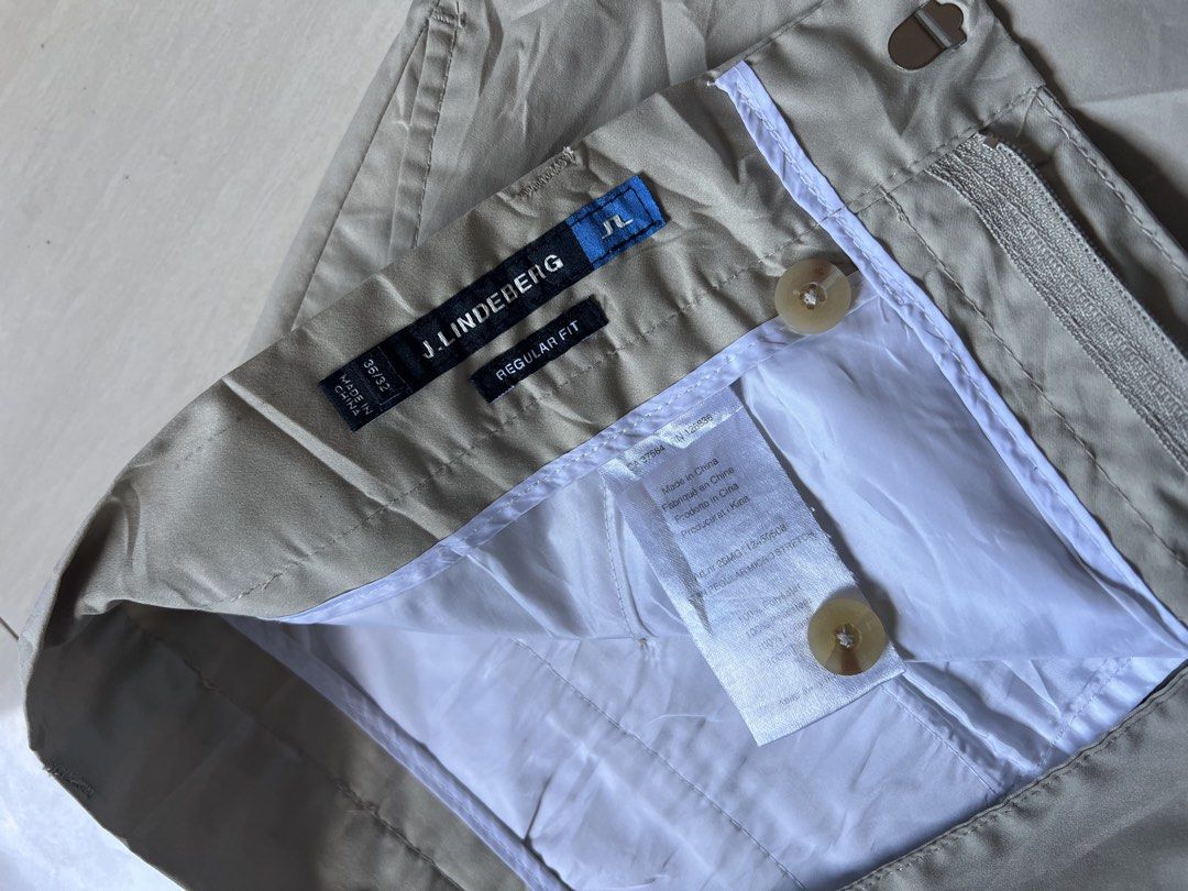 j.lindeberg Regular Fit Shorts 36/32 (Category: Shorts) located in Zamboanga. Submitted by safe.haimer (Listing ID 1437374270, Image 3). Description: - J.Lindeberg shorts - Size: 38 - Fit: Regular - Color: Light beige/khaki - Features: Button closure, pockets - Details: J.Lindeberg logo on back pocket.