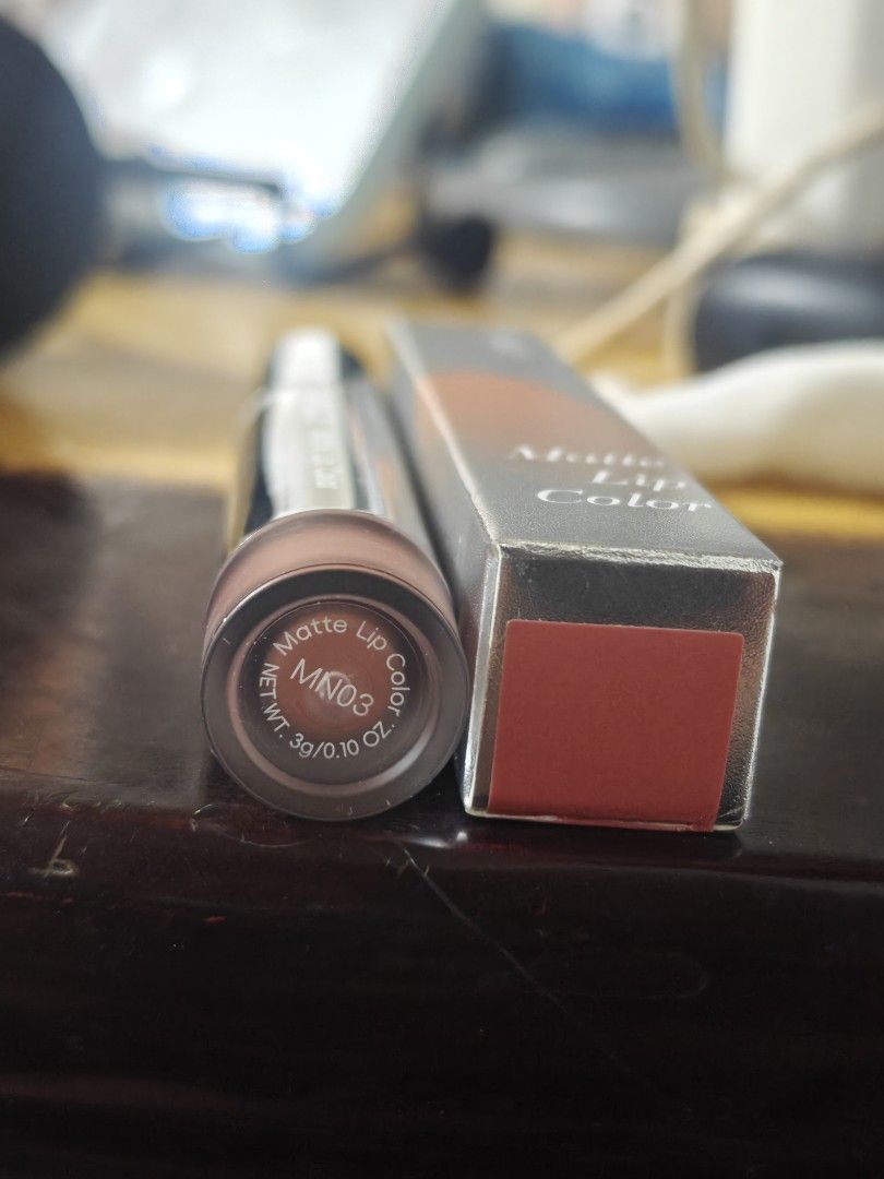 J.M.C.Y Matte Lip Color MN03 (Category: Makeup) located in Balanga. Submitted by einein (Listing ID 1437261843, Image 2). Description: - J.M.C.Y Matte Lip Color -Used 2x - Shade: MN03 - Texture: Velvet - Color: Muted reddish-brown - Packaging: Silver tube and matching box - Net Weight: 3g / 0.10 oz.