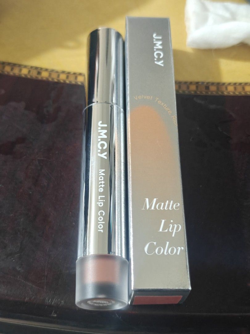 J.M.C.Y Matte Lip Color MN03 (Category: Makeup) located in Balanga. Submitted by einein (Listing ID 1437261843, Image 1). Description: - J.M.C.Y Matte Lip Color -Used 2x - Shade: MN03 - Texture: Velvet - Color: Muted reddish-brown - Packaging: Silver tube and matching box - Net Weight: 3g / 0.10 oz.