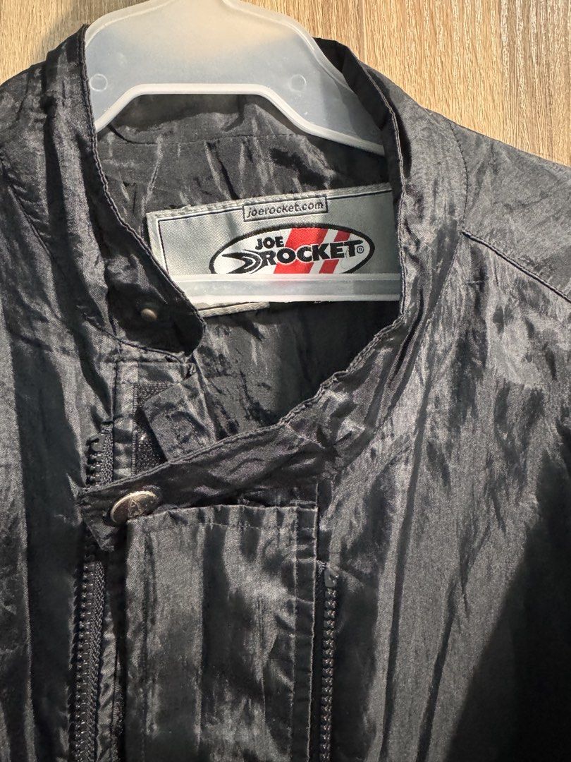 Joe rocket motorcycle riding jacket (Category: Coats, Jackets and Outerwear) located in Manila. Submitted by chskaiode (Listing ID 1437396670, Image 2). Description: Joe rocket motorcycle riding jacket Size: medium-large - Original joe rocket - Full-zip front for easy integration and removal. - Stand-up collar with a snap closure for wind protection. - Lightweight polyester/nylon material .