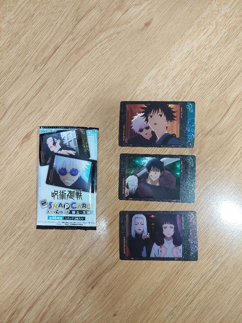 Jujutsu Kaisen Official Merch (Snap Card / Trading Cards / Gashapon) (Category: Toys & Games) located in Pasig City. Submitted by lo.flo (Listing ID 1437328634, Image 3). Description: Jujutsu Kaisen Official Merch ❗Bought from Animate Japan and Bandai Gashapon Japan❗ ❗Comes in original packaging❗ ✅ AVAILABLE ● (1) UNSEALED Jujutsu Kaisen 5th Anniversary Trading Clear Card (Transparent) - Megumi Fushiguro ● (1) UNSEALED Jujutsu Kaisen 3pcs Snap Ca