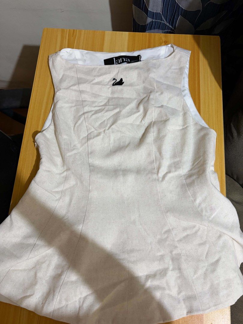 Lana Swan Top - Size S (Category: Blouses) located in Cabuyao City. Submitted by declutter_w_mee (Listing ID 1437347874, Image 3). Description: Peplum Design got this for: 1039 Pesos.