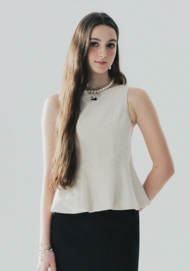 Lana Swan Top - Size S (Category: Blouses) located in Cabuyao City. Submitted by declutter_w_mee (Listing ID 1437347874, Image 1). Description: Peplum Design got this for: 1039 Pesos.