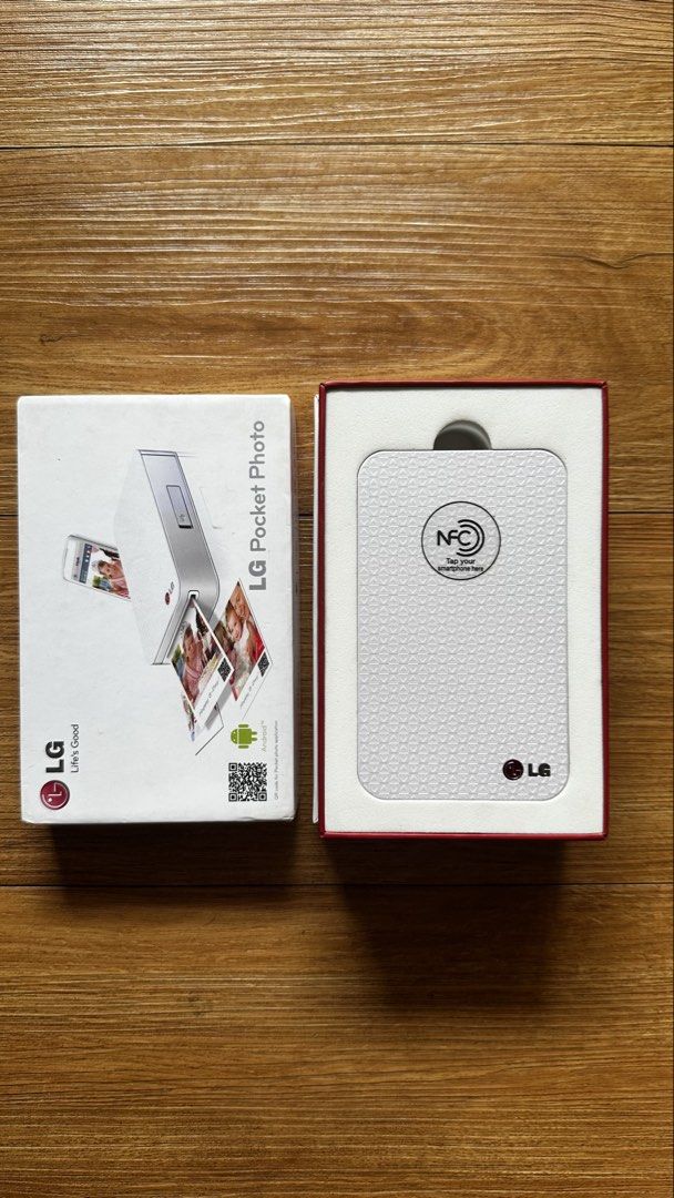LG Pocket Photo PD221 Portable Printer (Category: Printers, Scanners & Copiers) located in Paranaque City. Submitted by safedolphin.dc2bd2 (Listing ID 1437280769, Image 2). Description: - Vintage LG Pocket Photo PD221 portable printer - Used twice (inubos lang ung kasamang photo paper pack) - Uses ZINK photo paper - Works with Android only - Includes box, manual and USB cable - Device is working (charging, full charge, ON/OFF) - Bought in 2014 in