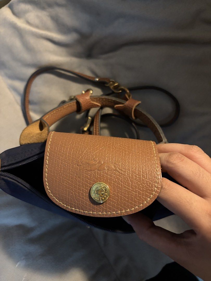 Longchamp Le Pliage Mini (Category: Luxury Bags & Wallets) located in Cebu City. Submitted by declutterie13 (Listing ID 1437316587, Image 3). Description: Authentic Le Pliage Mini (Navy Blue) with Free Strap and Strap Link .