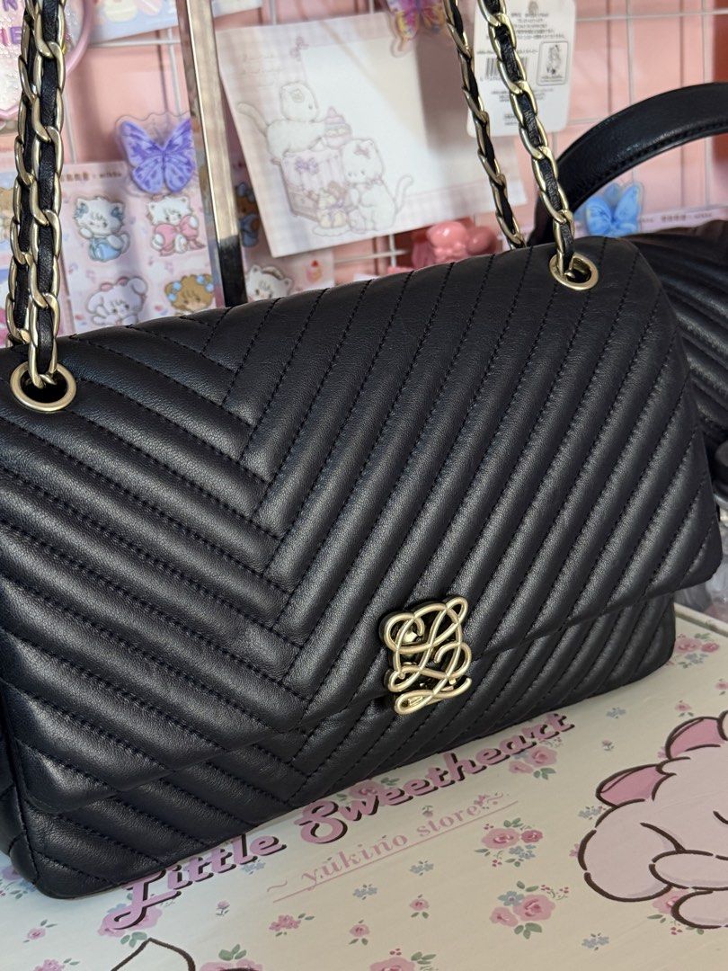 Louis Quatorez quilted convertible (Category: Luxury Bags & Wallets) located in Batangas. Submitted by declutterwithclare_ (Listing ID 1437383745, Image 2). Description: Like new condition ✨ Nothing to explain Genuine leather .