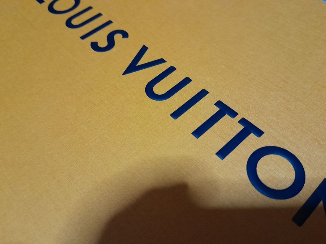 Louis Vuitton Medium Box with Ribbon and gift card (Category: Accessory Holder, Box & Organizers) located in Caloocan City. Submitted by josh.m138 (Listing ID 1437367552, Image 3). Description: - Authentic Louis Vuitton box for wallet with strap and clutches - Includes original ribbon, card, and envelope - Features original color and design - Sturdy and well-maintained condition - Ideal for gifting or storing luxury items.