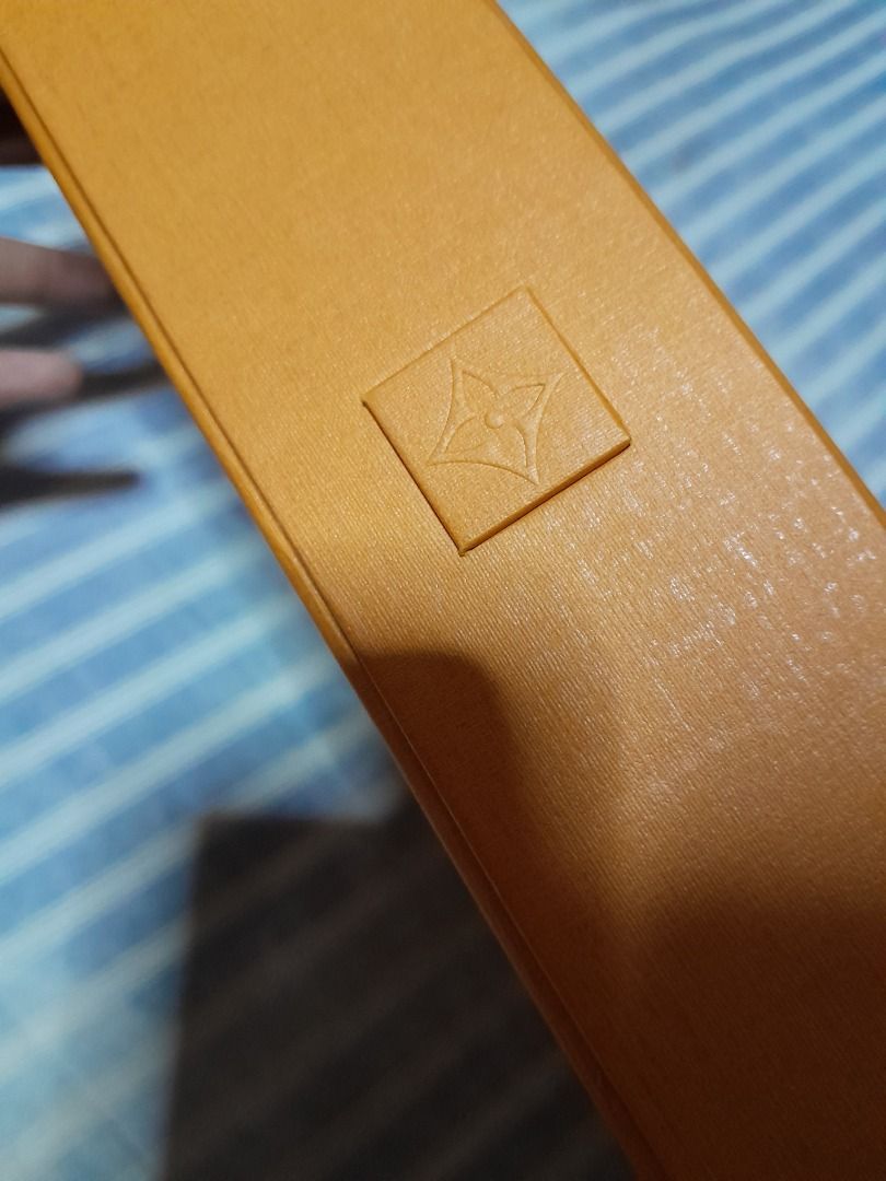 Louis Vuitton Medium Box with Ribbon and gift card (Category: Accessory Holder, Box & Organizers) located in Caloocan City. Submitted by josh.m138 (Listing ID 1437367552, Image 2). Description: - Authentic Louis Vuitton box for wallet with strap and clutches - Includes original ribbon, card, and envelope - Features original color and design - Sturdy and well-maintained condition - Ideal for gifting or storing luxury items.