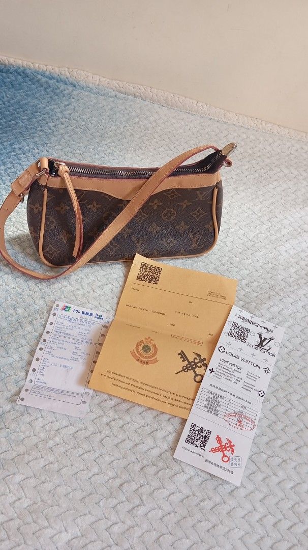 Louis Vuitton Monogram Shoulder Bag (Category: Luxury Bags & Wallets) located in Manila. Submitted by aasam_7c5684 (Listing ID 1437295812, Image 3). Description: - Authentic Louis Vuitton shoulder bag - Classic Monogram canvas - Tan leather trim and strap - Includes original receipts from Louis Vuitton Hong Kong - Stylish and iconic design - Perfect for everyday use.