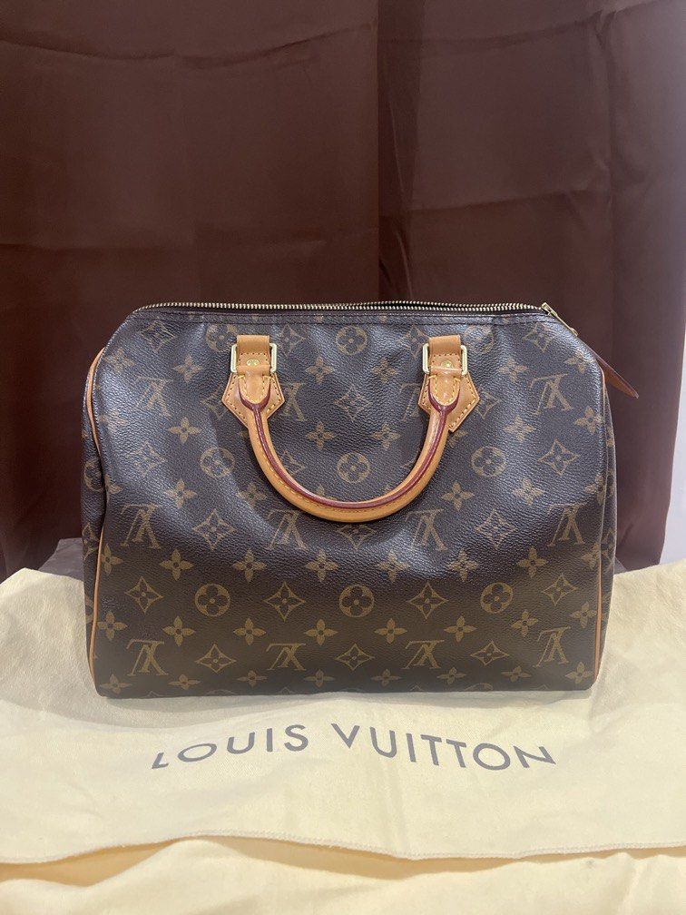 LV Louis Vuitton Speedy 30 Monogram Canvas (Category: Luxury Bags & Wallets) located in Cainta. Submitted by rsshopacc (Listing ID 1437217049, Image 1). Description: LV Louis Vuitton Speedy 30 Monogram Canvas Authentic - money back guarantee Lightly used, just carefully kept. Complete Inclusions: - tags - dustbag -box - paper bag - lock and key - receipt of purchase (pm for details) Purchased in Champs-Élysées in Paris Rfs: decluttering.