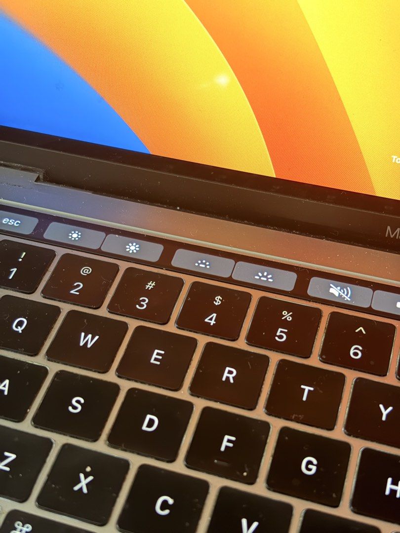 Macbook Pro 2019 with Touchbar (Category: Laptops & Notebooks) located in Manila. Submitted by jjeyvee_ms (Listing ID 1437268877, Image 3). Description: Macbook Pro 2019 with Touchbar - 13inch - intel core i5 - 8GB memory - 128GB SSD - touchbar working just fine - no issues with screen - Cycle count: 712 - Battery Condition: Normal Honest issue - May dalawang Type-C para sa charger pero yung isa hindi na gumagana (ung naka encircled) see photo. N