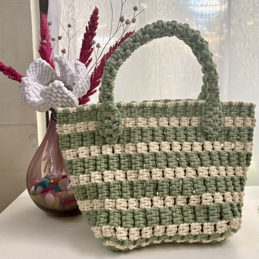 Macrame Handbag (Category: Shoulder Bags) located in Pasig City. Submitted by sinta_studio (Listing ID 1436664338, Image 2). Description: - Handmade macrame handbag - Features a woven design - Equipped with sturdy handles - Perfect for everyday use - Adds a touch of bohemian style.