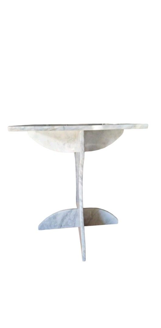 Marble Side Table (Category: Tables & Sets) located in Pasig City. Submitted by kjh000522 (Listing ID 1437306620, Image 2). Description: - Elegant marble side table - Square tabletop - Unique base design - Crafted from marble with natural color variations - Ideal for living rooms or bedrooms - Perfect as a side table or decorative accent.