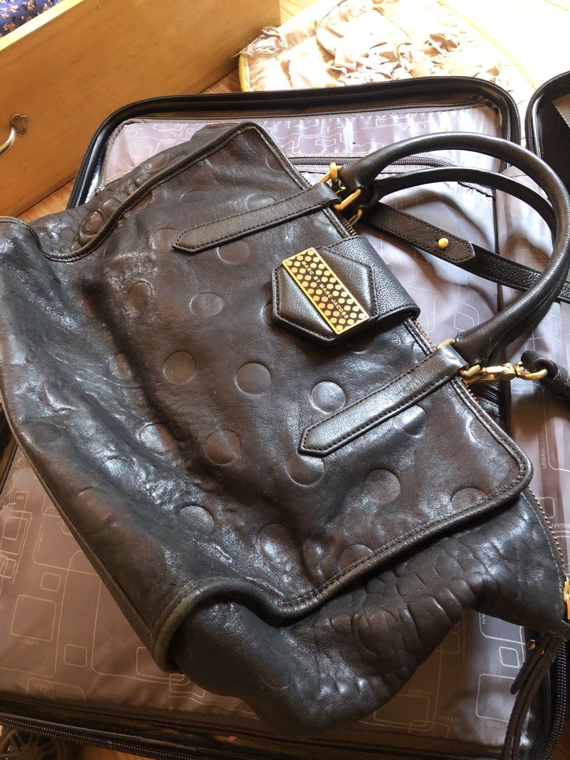 Marc by Marc Jacobs Leather Handbag (Category: Luxury Bags & Wallets) located in Siquijor. Submitted by yhostuff (Listing ID 1437219950, Image 2). Description: - Brand: Marc by Marc Jacobs - Material: 100% Lamb Leather, Cow Leather Trim - Color: Black - Hardware: Brass Gold-tone - Features: Shoulder strap, zipper closure, gold logo plate - Interior: Branded tag -P.S. NEED MILK POLISHING kasi not shiny na. Selling very2 low already. .