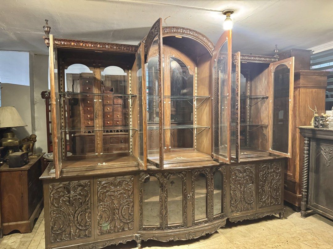 Massive 9ft Narra Vintage Back to Back Platera Display Cabinet (Category: Vintage Collectibles) located in Manila. Submitted by sinaunang_gamit (Listing ID 1437246815, Image 2). Description: Massive 9ft Narra Vintage Back to Back Platera Display Cabinet Length: 108 inches (9ft) Height: 89 inches Width: 31 inches Back to back carving Complete shelves Sturdy and ready to use ₱60k.
