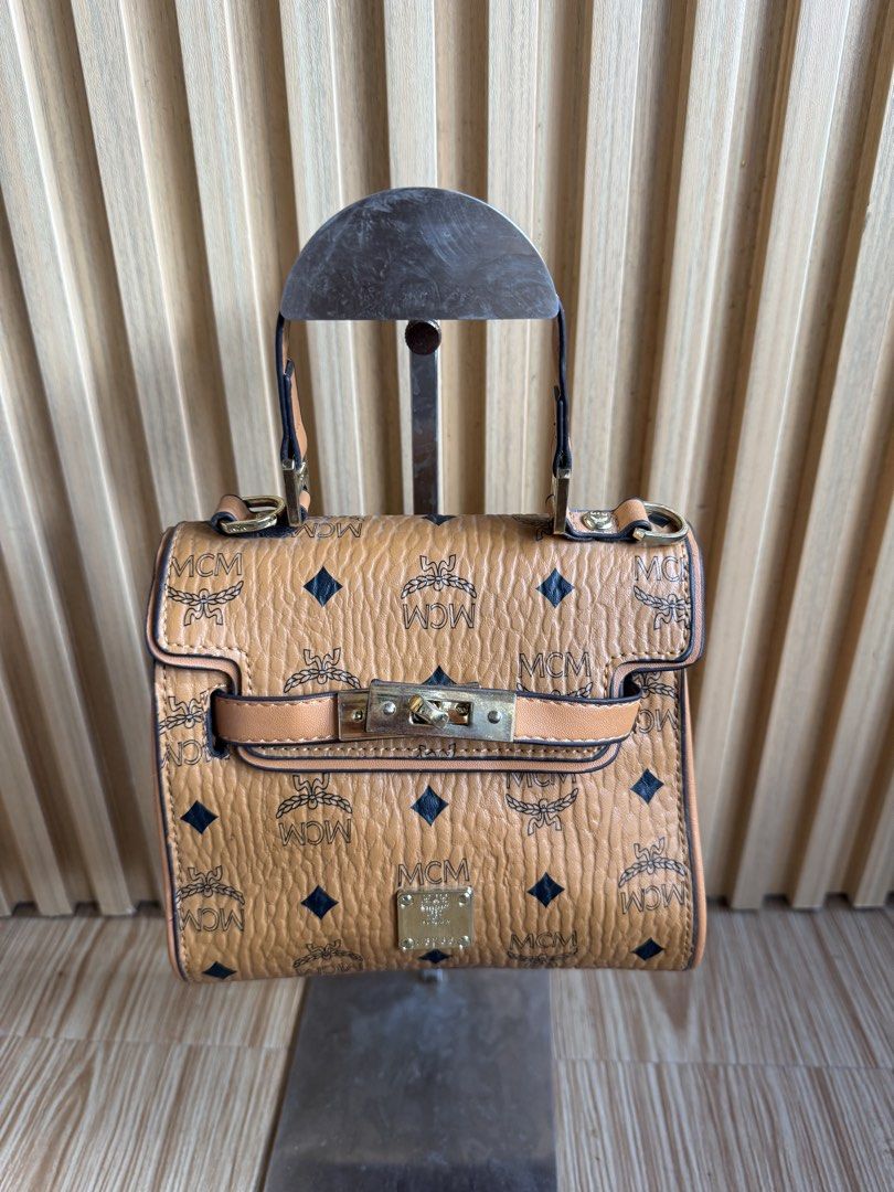 MCM (Category: Luxury Bags & Wallets) located in Lipa City. Submitted by thyra06 (Listing ID 1437352218, Image 3). Description: mcm mini kelly good as new🤎🤎🤎😍.
